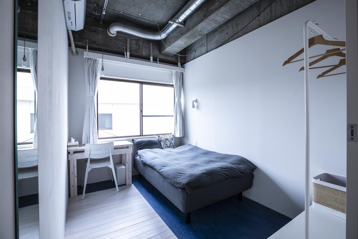 Furnished private room with semi-double bed at The Pier Coliving, Goto Islands