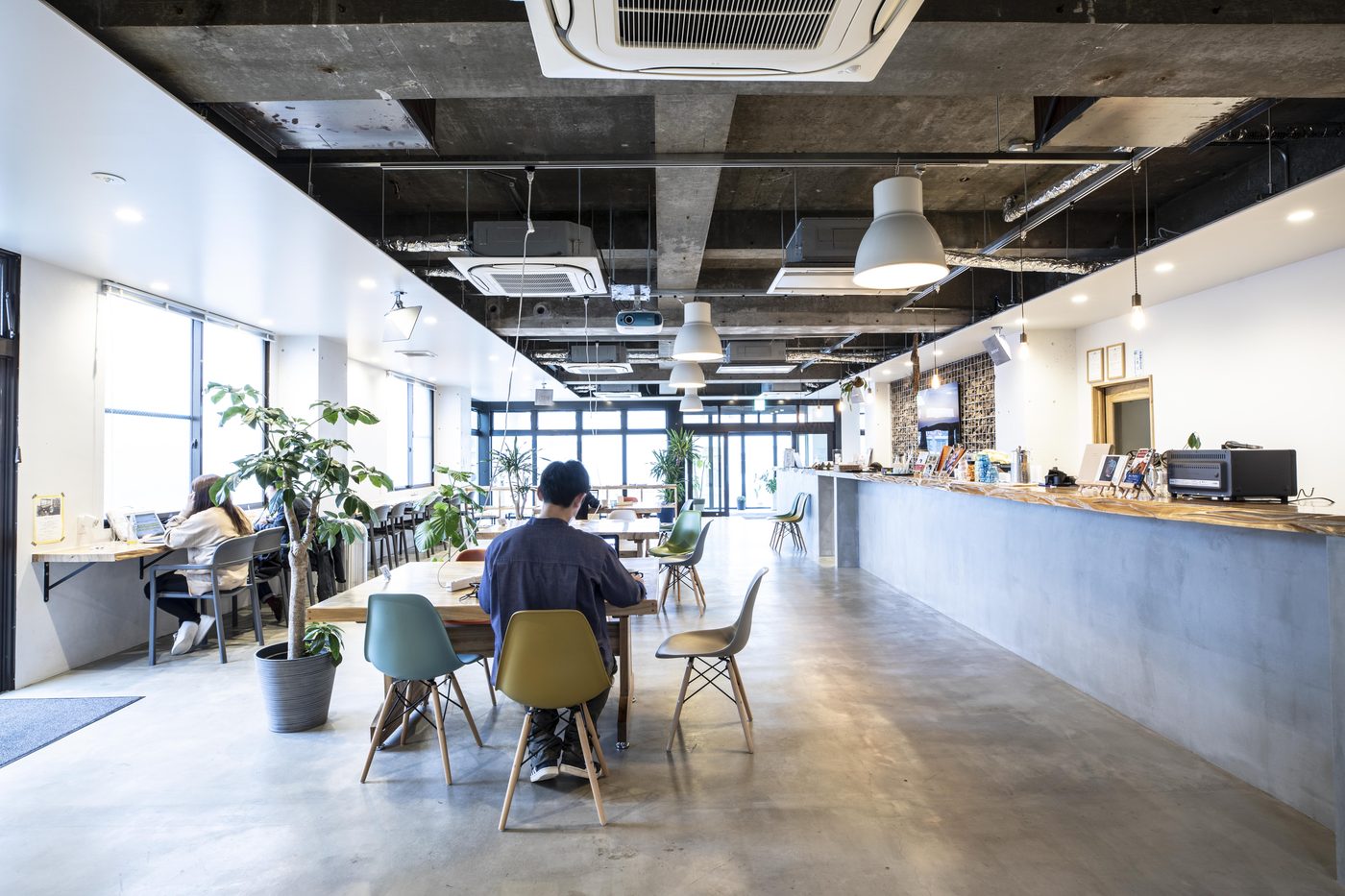 Coworking space for remote work at The Pier Coliving